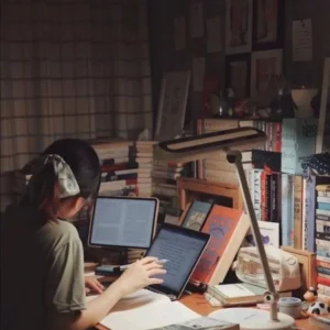 Anime Girl Studying At Desk